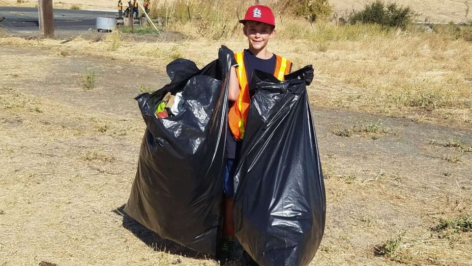 A young volunteer at Save Mount Diablo's 2019 Coastal Cleanup at Kirker Creek