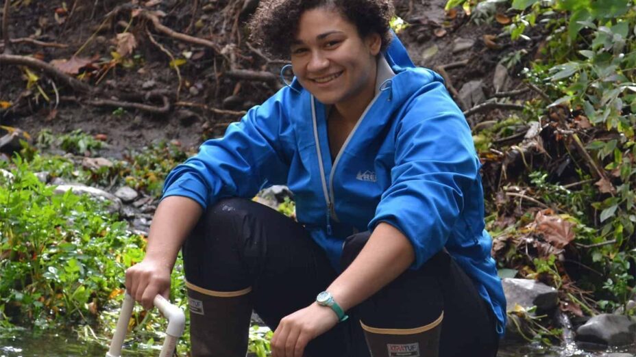 Emily King measuring invasive New Zealand mud snails in a creek as part of research sponsored by Save Mount Diablo