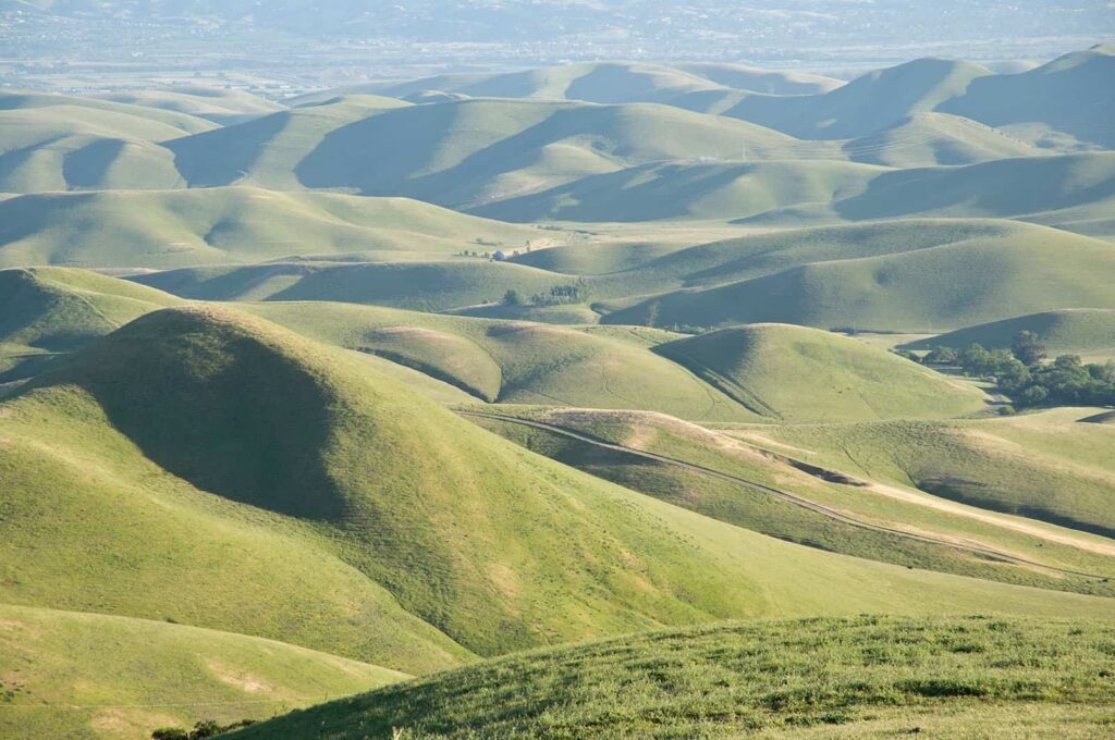 The rolling grassland and rugged terrain seen from Save Mount Diablo's Highland Springs property