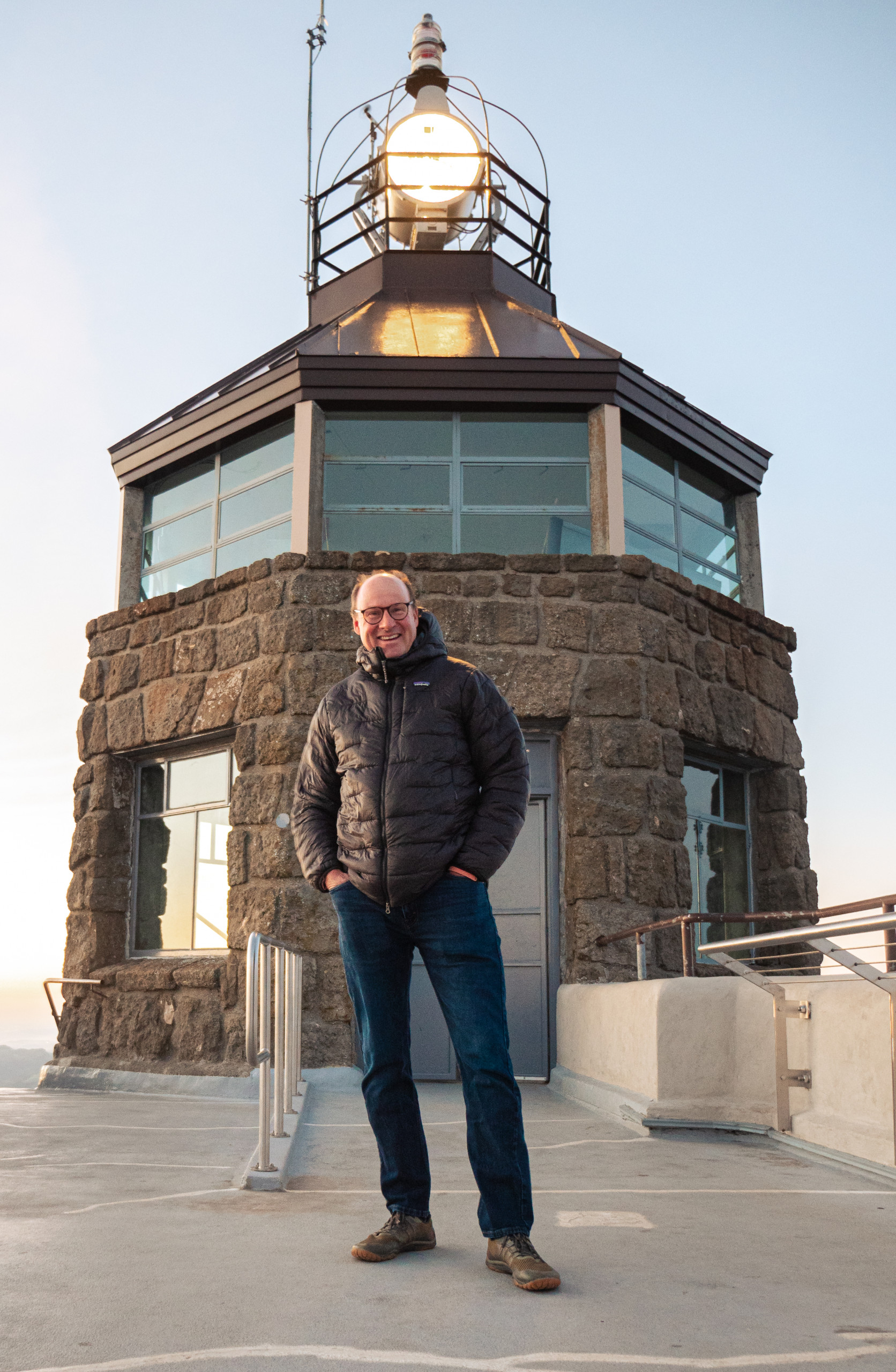 Ted Clement standing in front of the beacon