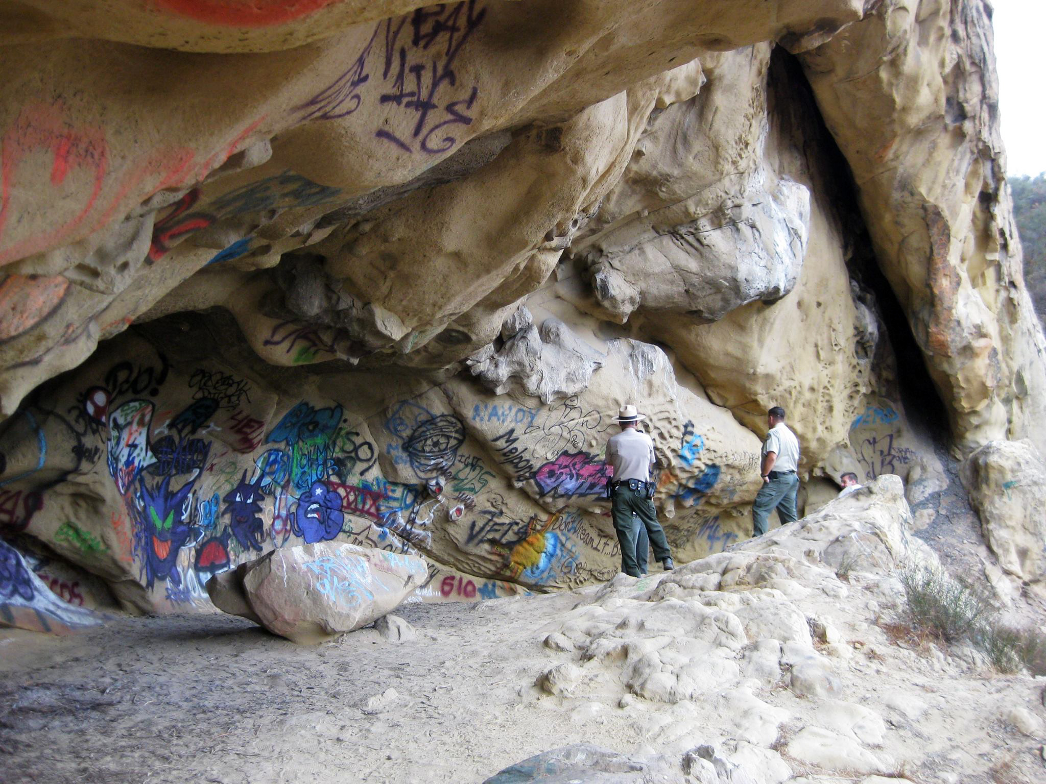 Graffiti all over rocks at castel rock