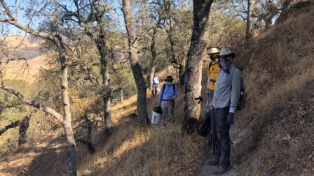 Volunteers picking up trash at pine canyon