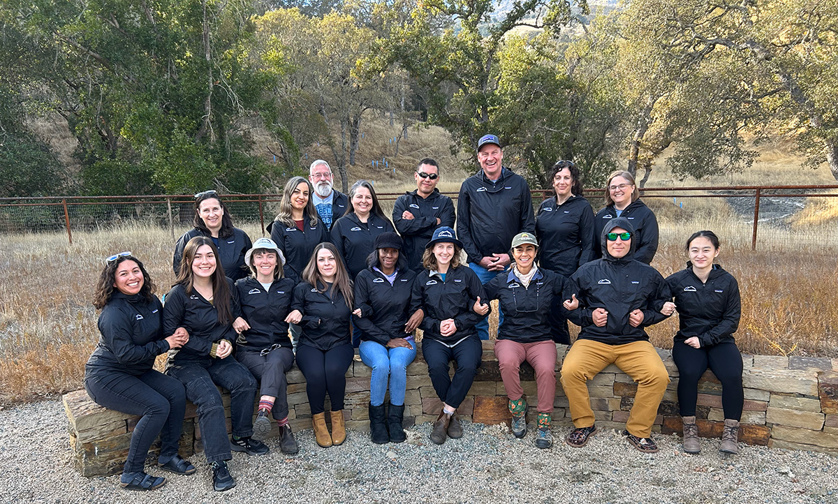 Save Mount Diablo staff sitting on a rock wall at our Curry Canyon Ranch property