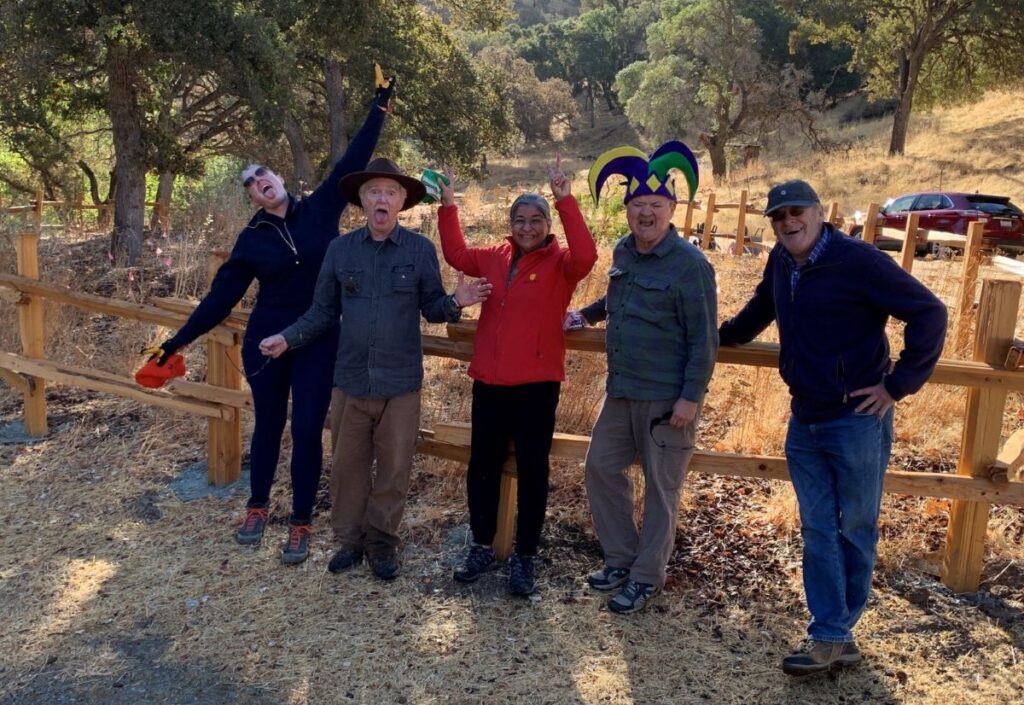 Spooky volunteers watering on Halloween at Marsh Creek 1&7