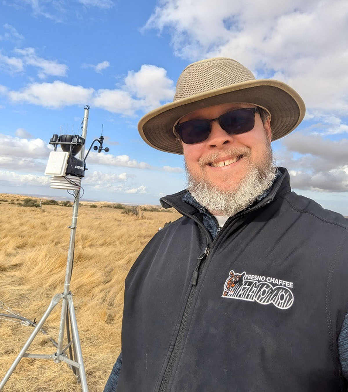 Dr. Rory Telemeco with the newly installed weather station